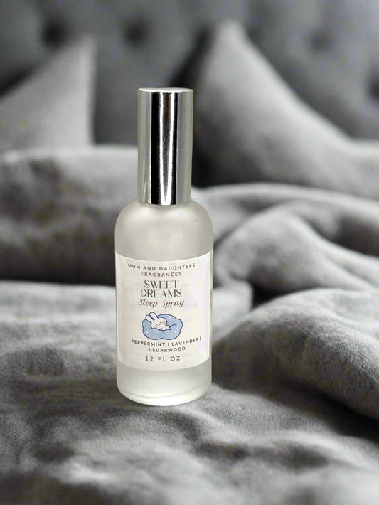 Eco-friendly Mom & Daughters Nighttime Sleep Spray with lavender, chamomile, and sandalwood. This calming mist promotes restful sleep, soothes the mind and body, and creates a peaceful bedtime atmosphere. Safe for sensitive skin, sustainable, and non-toxic, it’s perfect for families seeking a natural, gentle sleep aid.